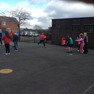 Class 7 practising Tag Rugby skills with Coach!